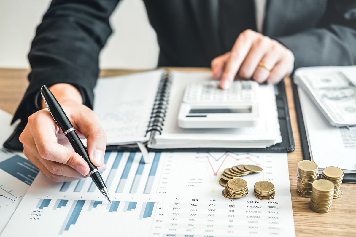 Business man accounting calculating cost economic budget investment saving u