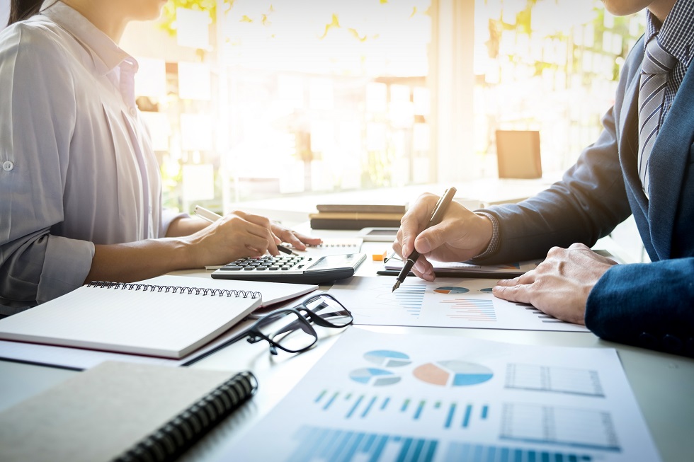 Business man financial inspector secretary making report calculating checking balance internal revenue service inspector checking document audit concept u